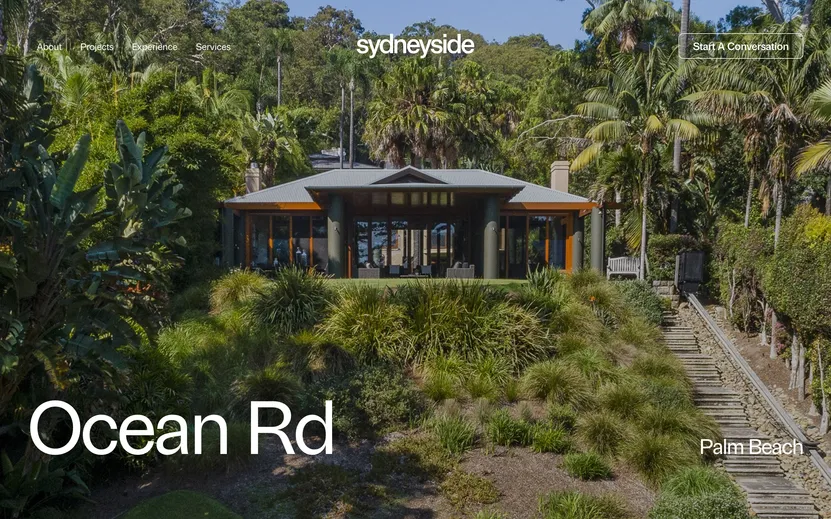 Sydneyside’s Ocean Rd project page on desktop: a house among palms and native garden, titled ‘Ocean Rd’ and ‘Palm Beach’.